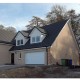 Redland Mini Stonewold Interlocking Concrete Roof Slate - Charcoal Grey - 334mm x 418mm Redland Mini Stonewold Interlocking Concrete Roof Slate - Charcoal Grey - 334mm x 418mm